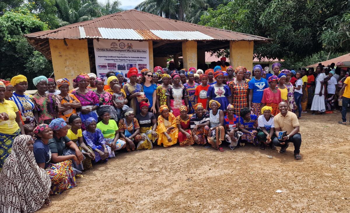 ERD Programme Manager Naidi McDonnell pictured with beneficiaries from the West Africa Livelihoods Project in Mabureh, Sierra Leone