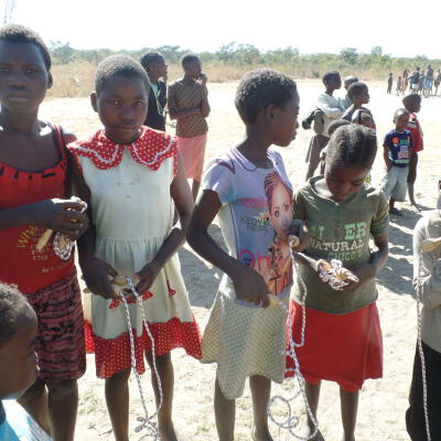 The Journeying Together team in Luampa held a fun day for local children who were not attending school. Over 350 children came to the fun day - their presence indicating a large population of children without access to education. This was the first time the children held skipping ropes and played with real footballs.