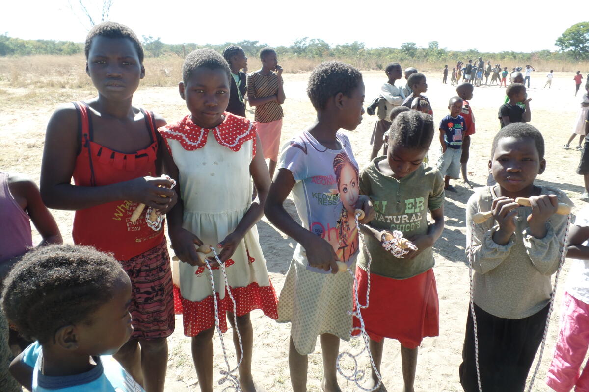 The Journeying Together team in Luampa held a fun day for local children who were not attending school. Over 350 children came to the fun day - their presence indicating a large population of children without access to education. This was the first time the children held skipping ropes and played with real footballs.