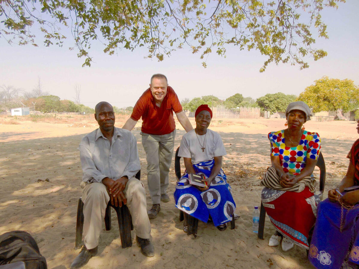 Programme Coordinator Michael Hanly with Senanga community members