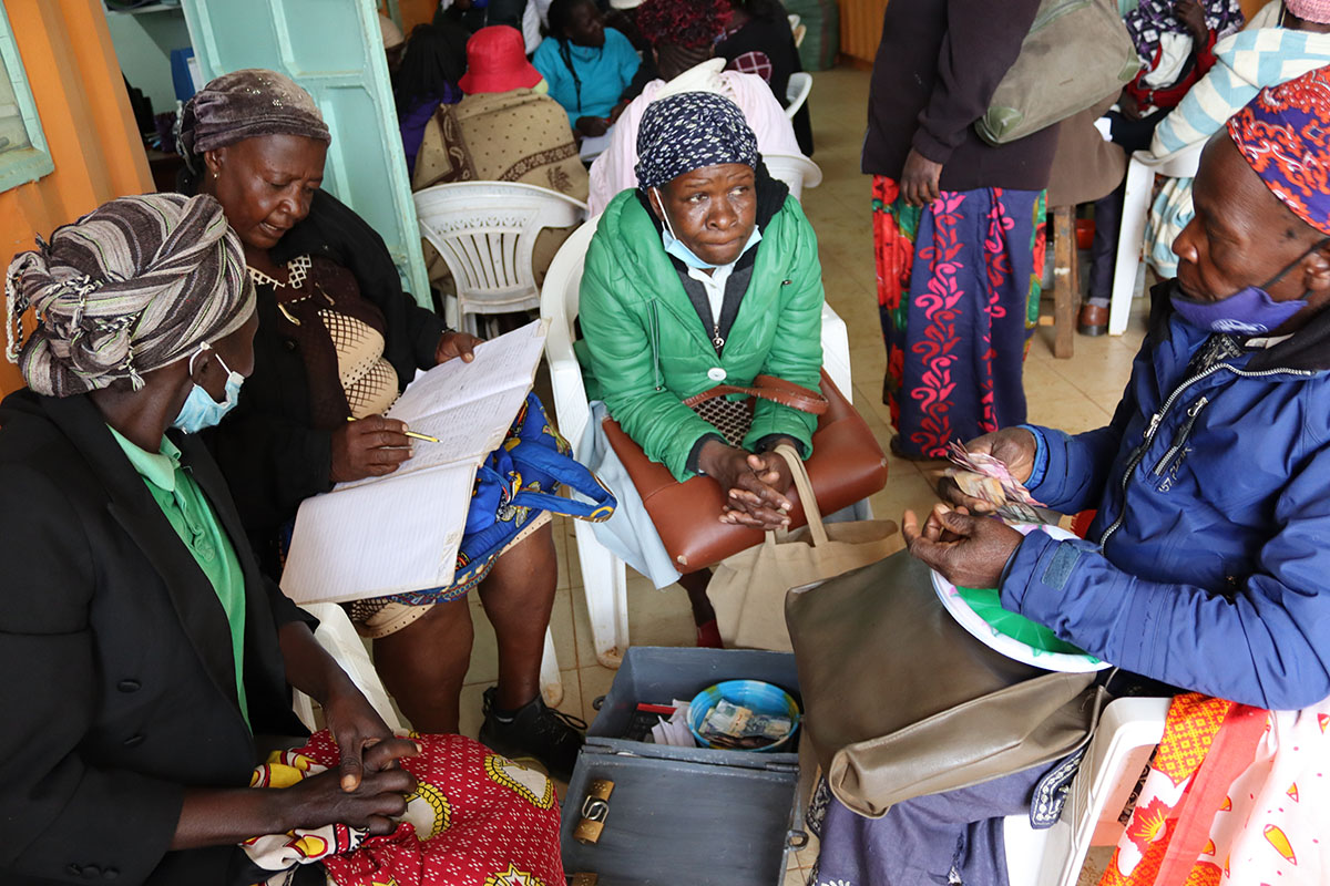 EFL beneficiaries taking part in their Savings and Internal Lending Community (SILC) group as part of the project's economic empowerment initiatives