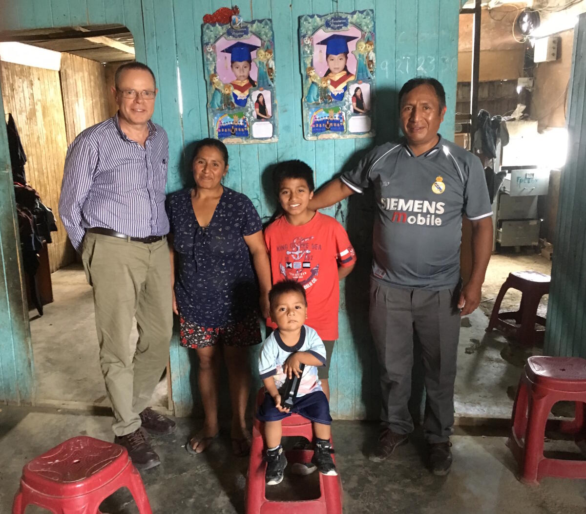 Michael on a home visit to a local family (Mrs. Elizabeth Medina and Mr. Cristian Guadalupe with their children) supported by the Fe y Alegría project in Lima, Peru.